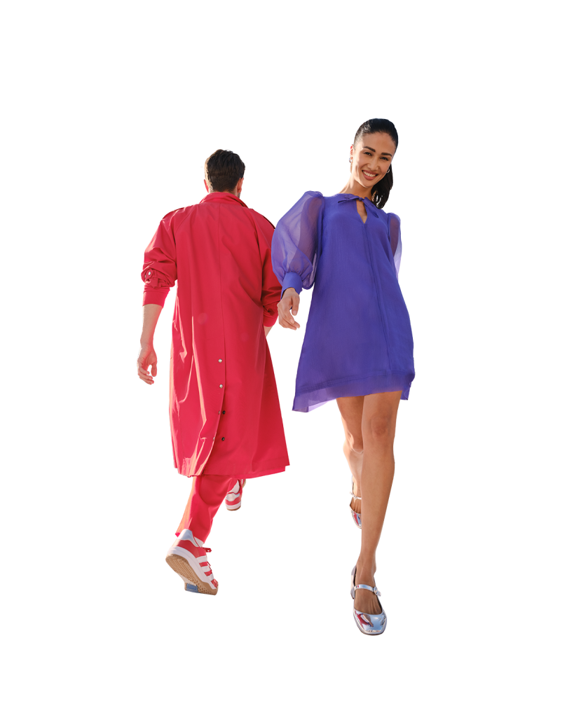 A male and female model, walking on a runway above an UWS Residence at 720 West End Avenue